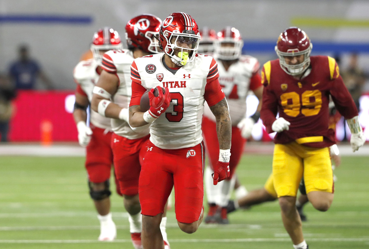 Utah running back Ja’Quinden Jackson runs for a touchdown against USC.
